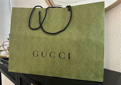 shopping bag gucci costo|Gucci shopping bag in store.